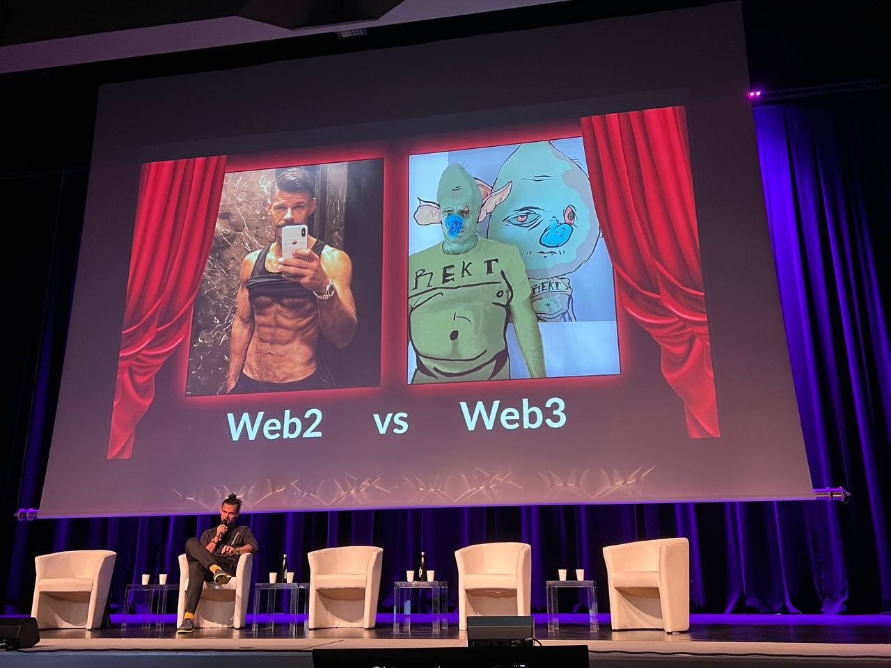 Геннадий на главной сцене NFT Fest Lugano, на экране слайд «Web2 vs Web3»